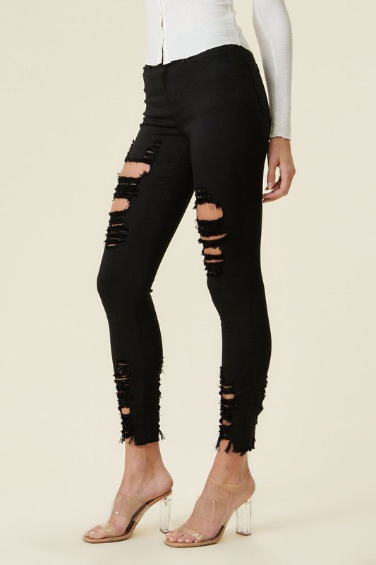 BLACK High Rise Distressed Skinny Jeans with a Raw Hem