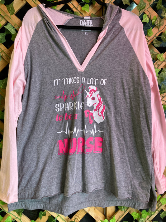 Dare Me Wear “It Takes A Lot Of Sparkle To Be A Nurse” V-Neck Hooded Top