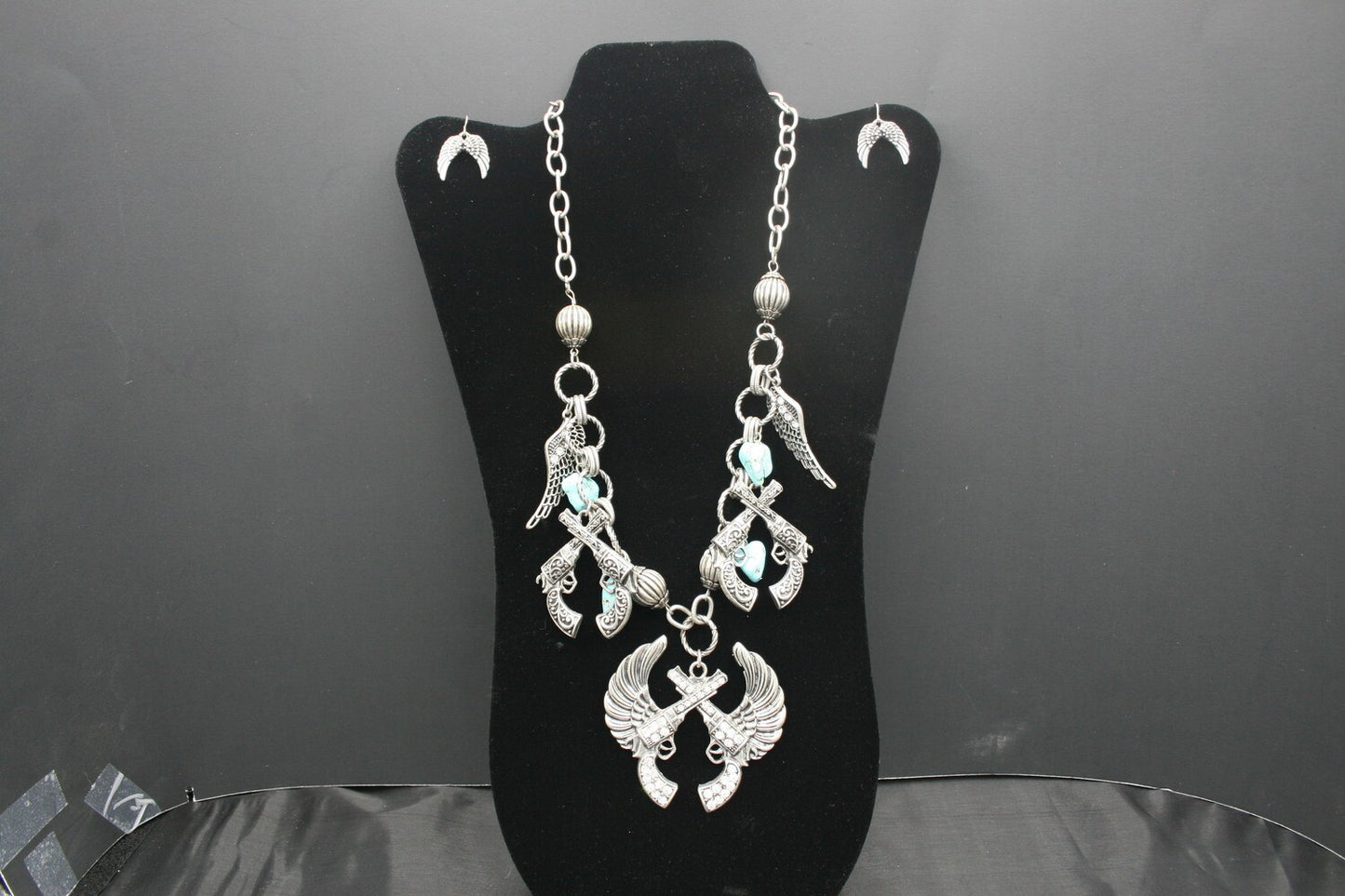 Pistol and Wing Necklace and Earring Set